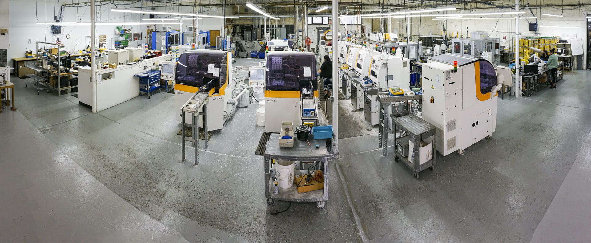 A factory with many machines on the floor